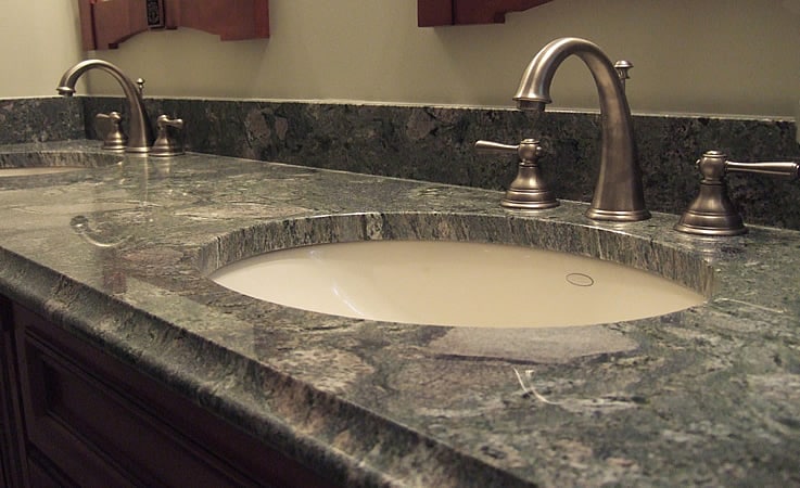 Granite Bathroom Vanity With Floral Wallpaper